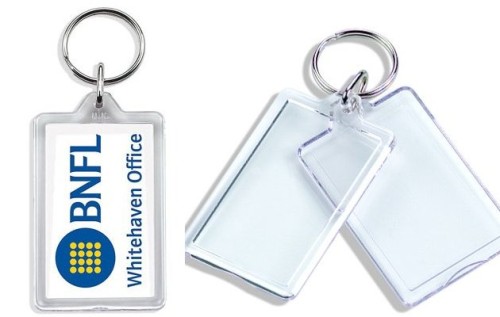 Brelok akrylowy, 63 x 37 mm, wkładka z obustronnym nadrukiem, cena dla 100 szt.